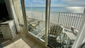 A balcony with a view of the beach and ocean. - Gulf-Front Corner Unit~Same-Floor Parking~Wrap Balcony~FREE Beach Chairs~Sleep 8 (Panama City Beach)