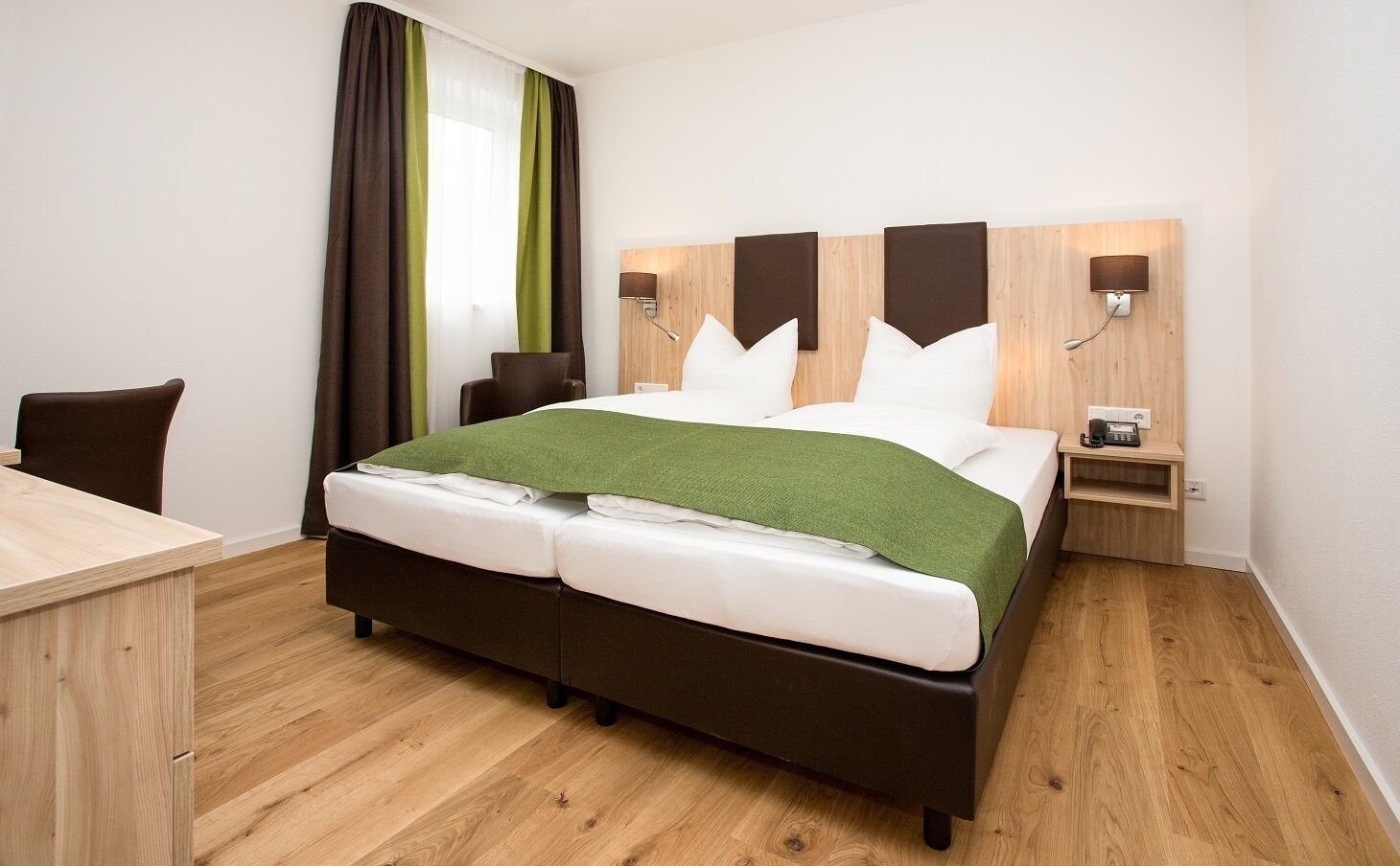 Ferienwohnung 1 mit kostenfreiem WLAN-Zimmeransicht / Schlafbereich Ferienwohnung