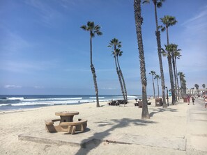 On the beach, sun-loungers, beach towels
