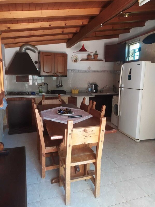 Fridge, stovetop, cookware/dishes/utensils