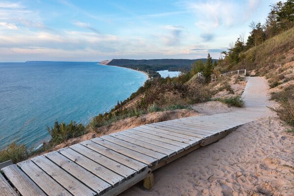 On the beach, beach towels - Lake Leelanau Waterfront With Dock and Panoramic Views. Close to Everything! (Lake Leelanau)