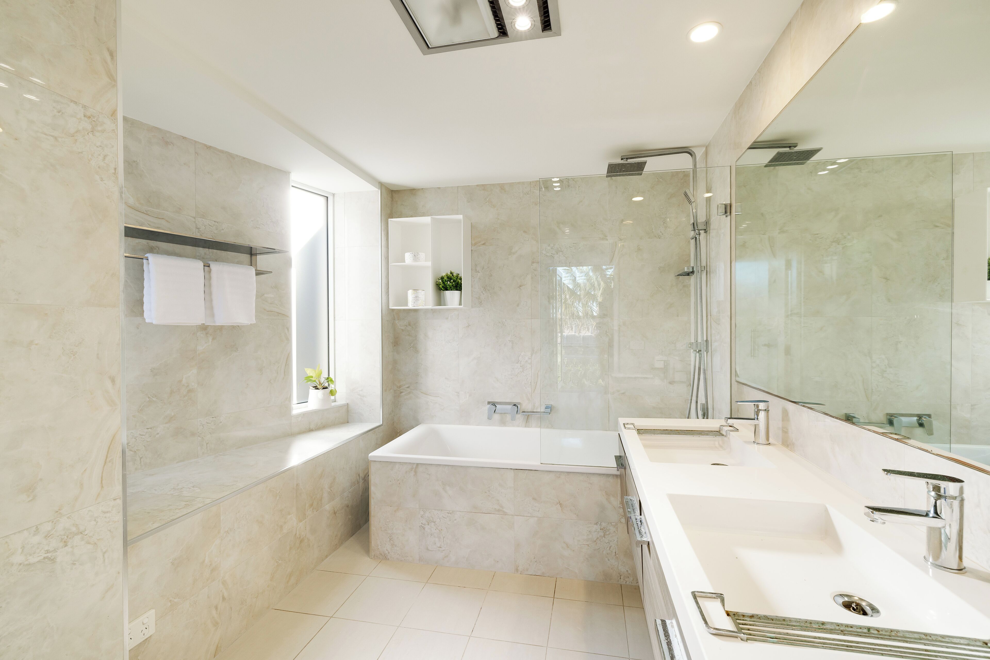 Bathtub, hair dryer, towels, soap