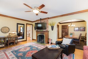 Smart TV, fireplace, books