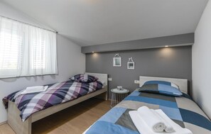 2 quartos, Wi-Fi de cortesia, roupa de cama