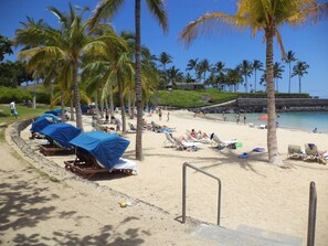 On the beach, sun-loungers, beach towels