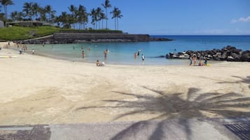 On the beach, sun-loungers, beach towels