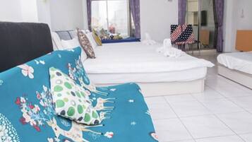 Family Room, 1 Bedroom, Lanai, City View | Down comforters, free WiFi, bed sheets