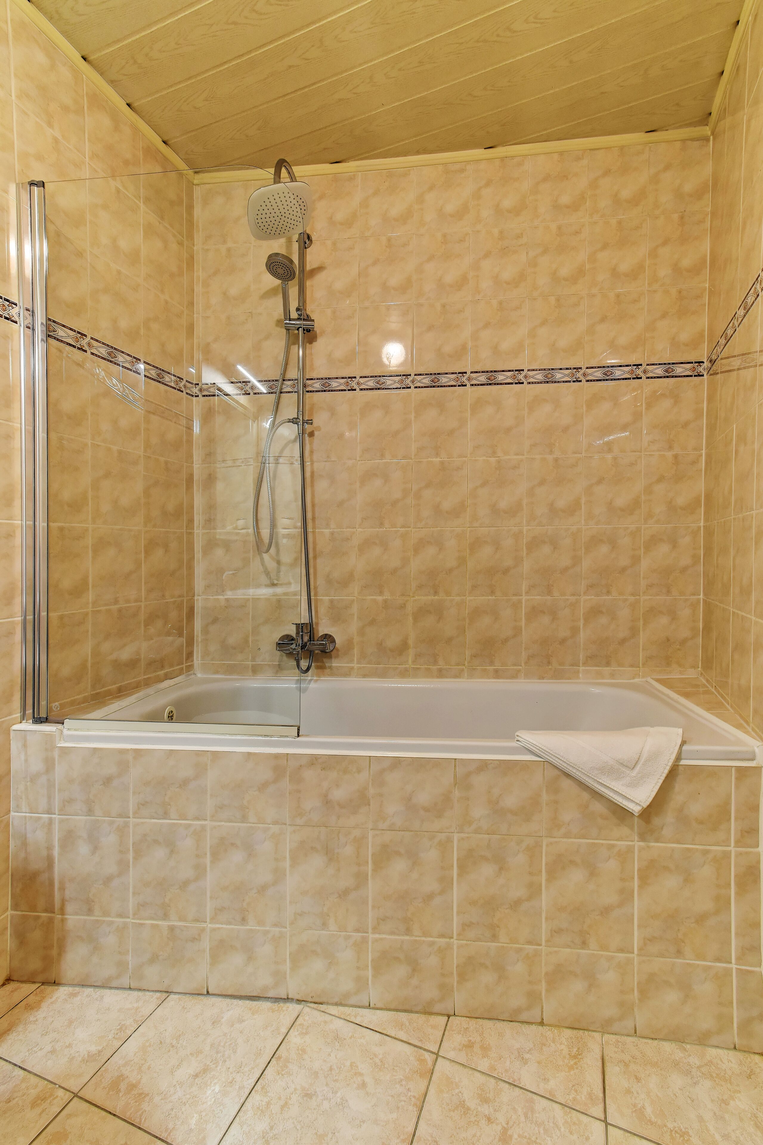 superior double room | bathroom | shower, free toiletries, hair dryer, towels