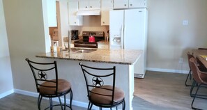 Fridge, microwave, oven, stovetop - Entire house with private patio, fenced in yard and two car garage in quiet area (Farmers Branch)