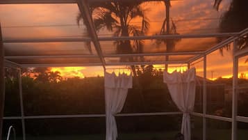 A heated pool, sun loungers