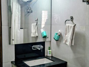 Standard Room | Bathroom | Shower, hydromassage showerhead, free toiletries, slippers - Rains Inn (Guwahati)