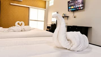 Suíte superior, vista para o jardim | Roupas de cama premium, escrivaninha, camas extras/dobráveis (sobretaxa)