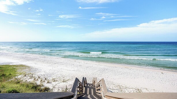 A wooden boardwalk leading to a beach with white sand and ocean waves. - Seacrest Beach Home + Dog Friendly, Tram & Bikes (Seacrest Beach)