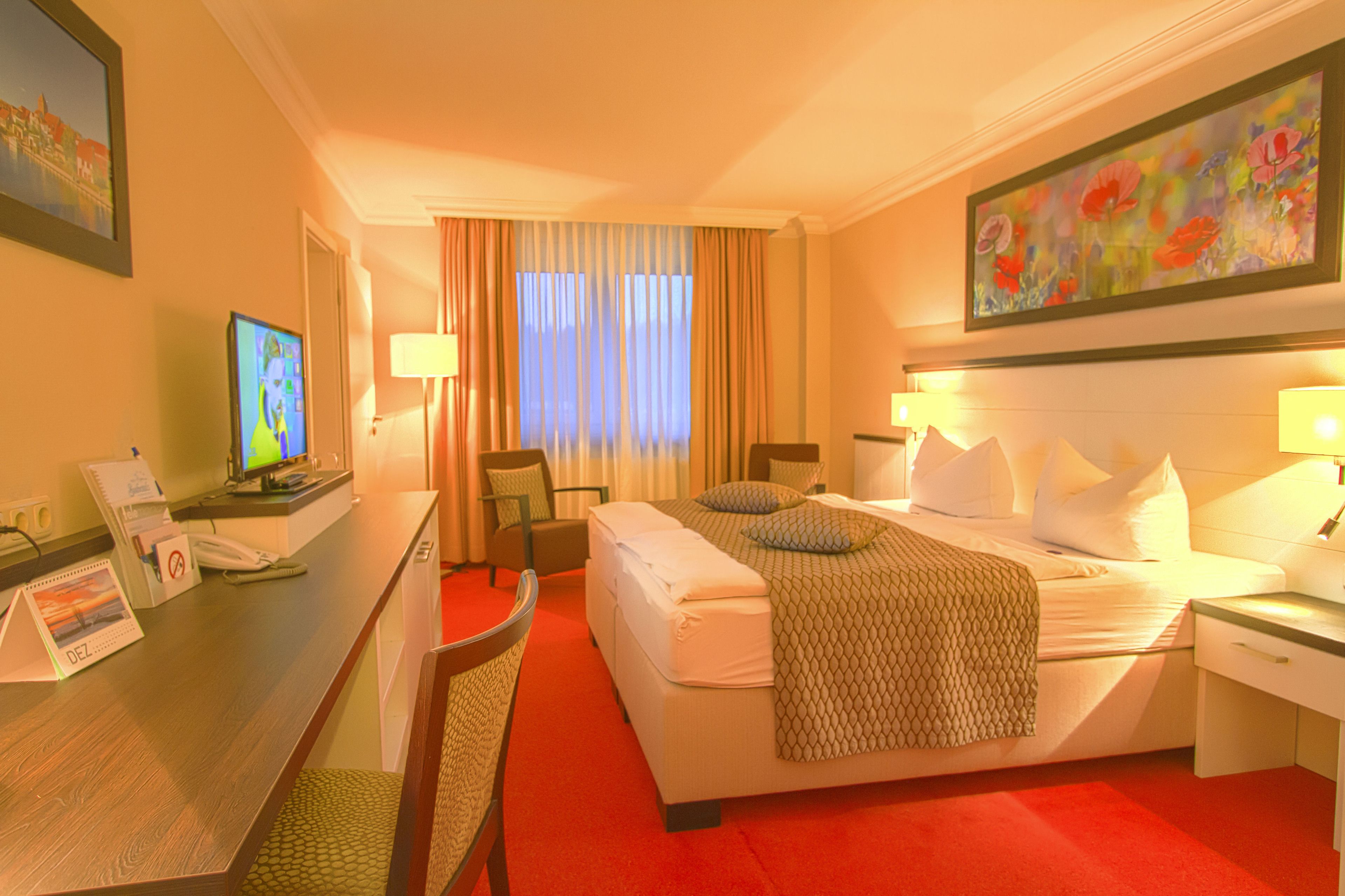 family room | hypo-allergenic bedding, desk, blackout curtains, soundproofing