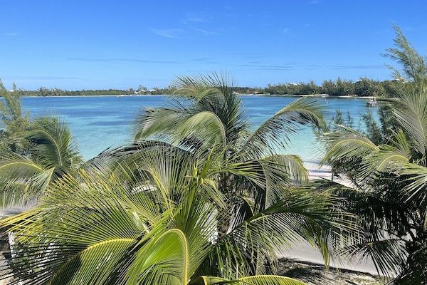 Na praia, toalhas de praia