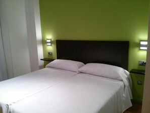 Premium bedding, desk, blackout curtains, soundproofing