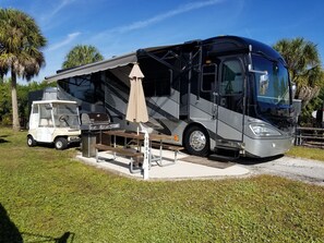 Enjoy outdoor activities under the motorhome's retractable awning.