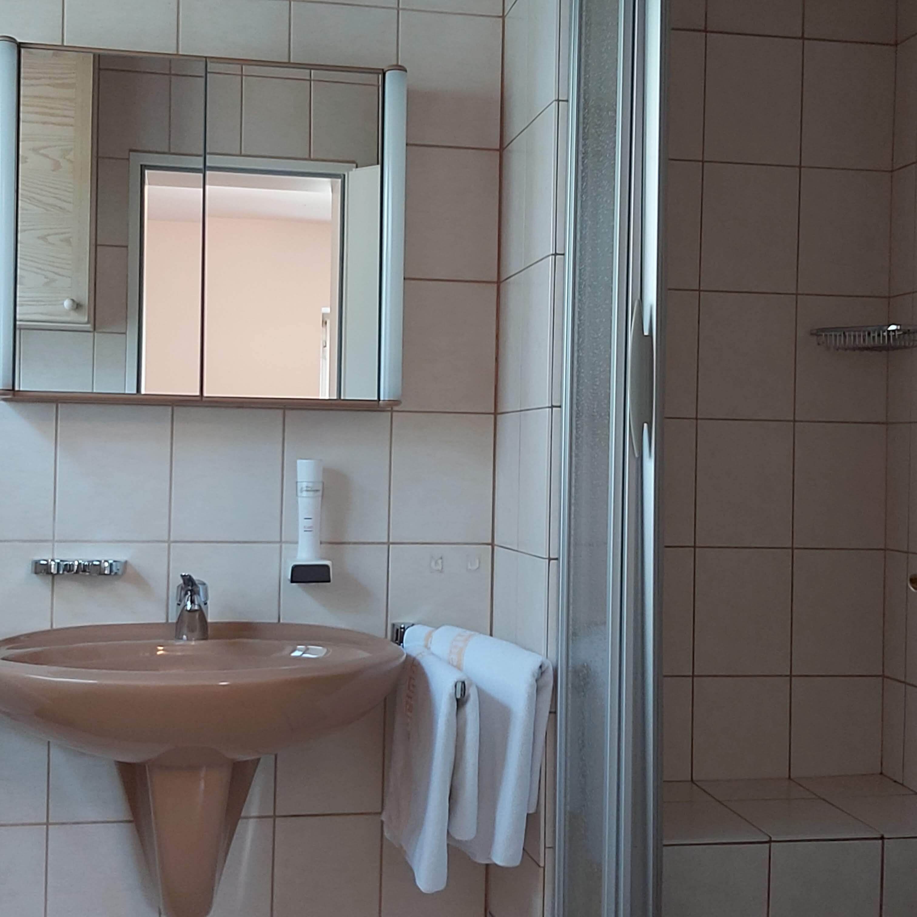townhome, annex building | bathroom | shower, free toiletries, hair dryer, bathrobes