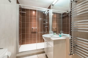 Apartment, 1 Bedroom | Bathroom | Shower, free toiletries, hair dryer, towels