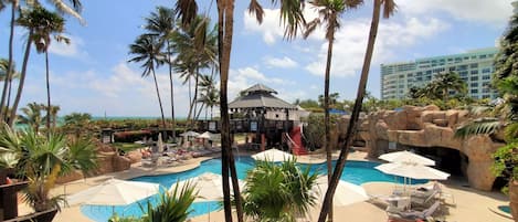 A heated pool, pool umbrellas