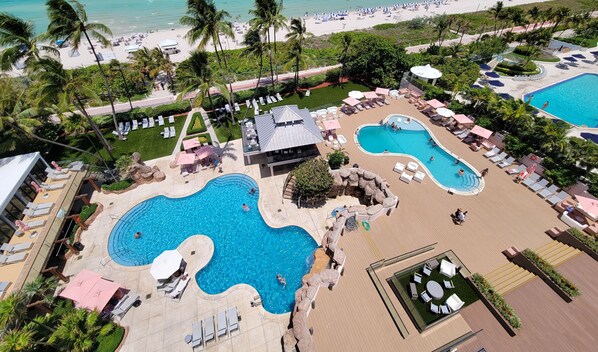 A heated pool, pool umbrellas
