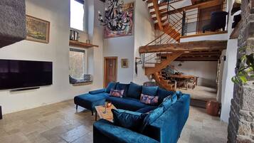 Superior House | Living area | Flat-screen TV