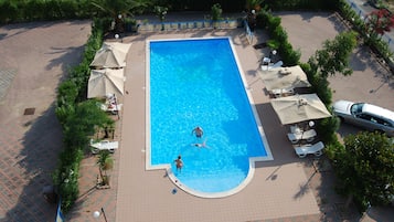 Outdoor pool, a rooftop pool, sun loungers