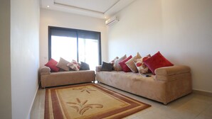 Apartment, 2 Bedrooms, Beach View | Living room