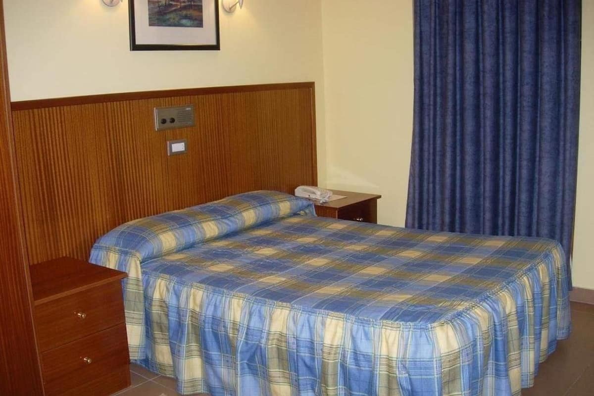 Desk, blackout curtains, cots/infant beds, rollaway beds
