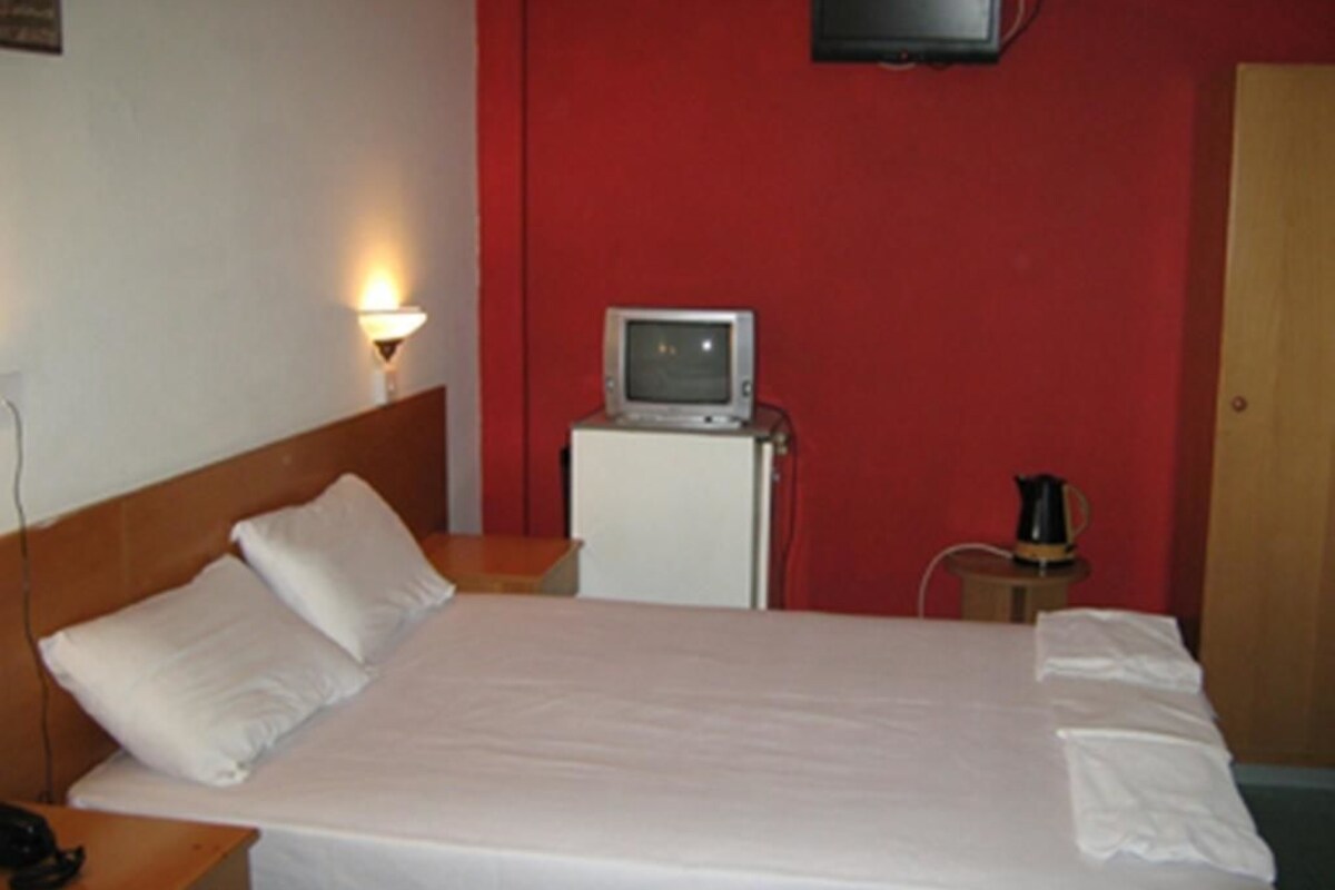 Wi-Fi de cortesia, roupa de cama
