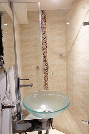 Shower, rainfall showerhead, towels, soap
