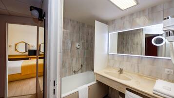 Bathtub, hair dryer, towels