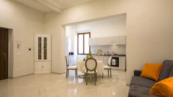 Romantic Condo, 2 Bedrooms | Living area | Flat-screen TV