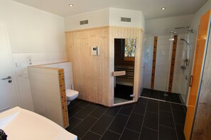 Shower, hair dryer, toilet paper