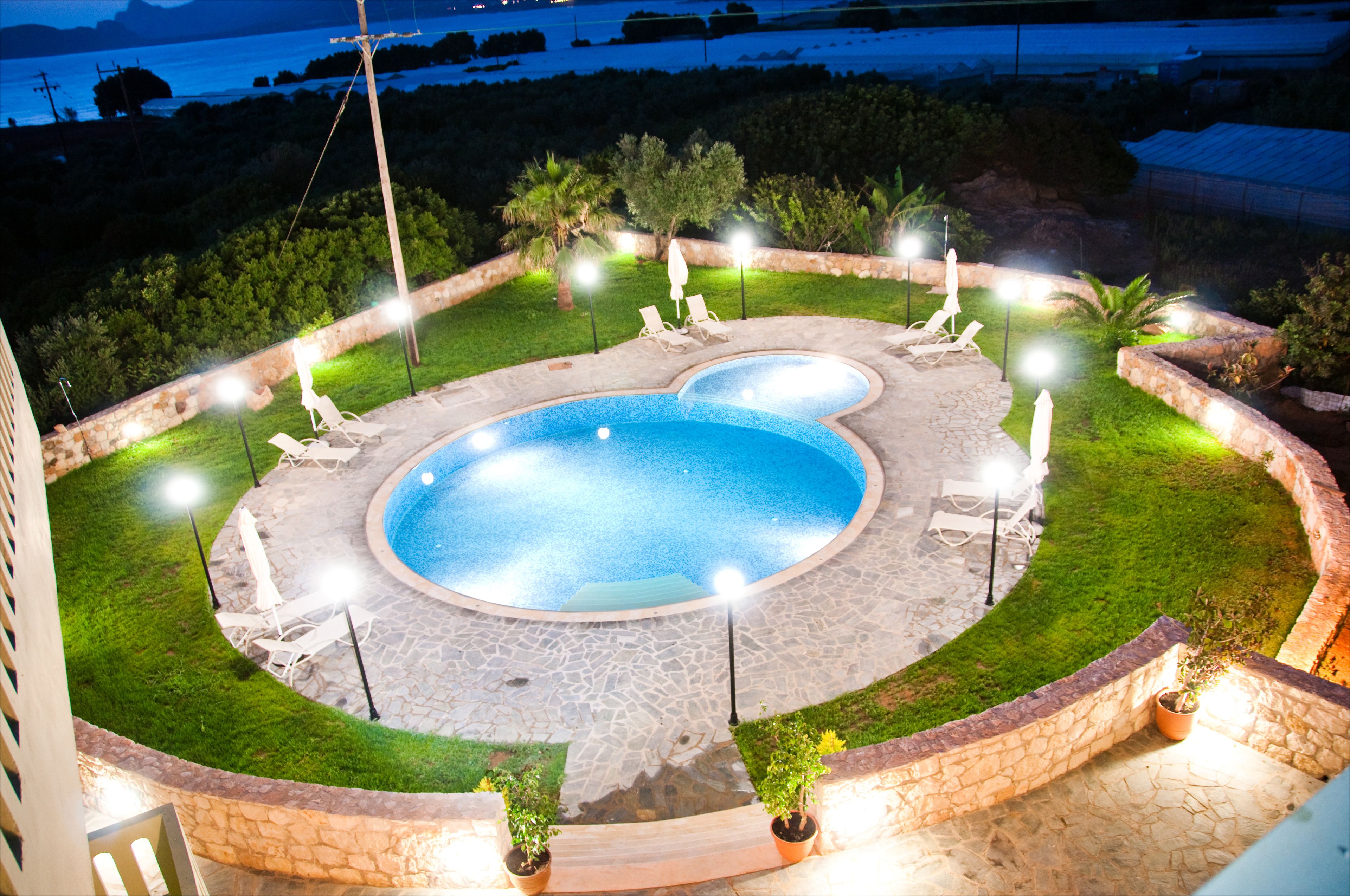 seasonal outdoor pool, pool umbrellas, pool loungers