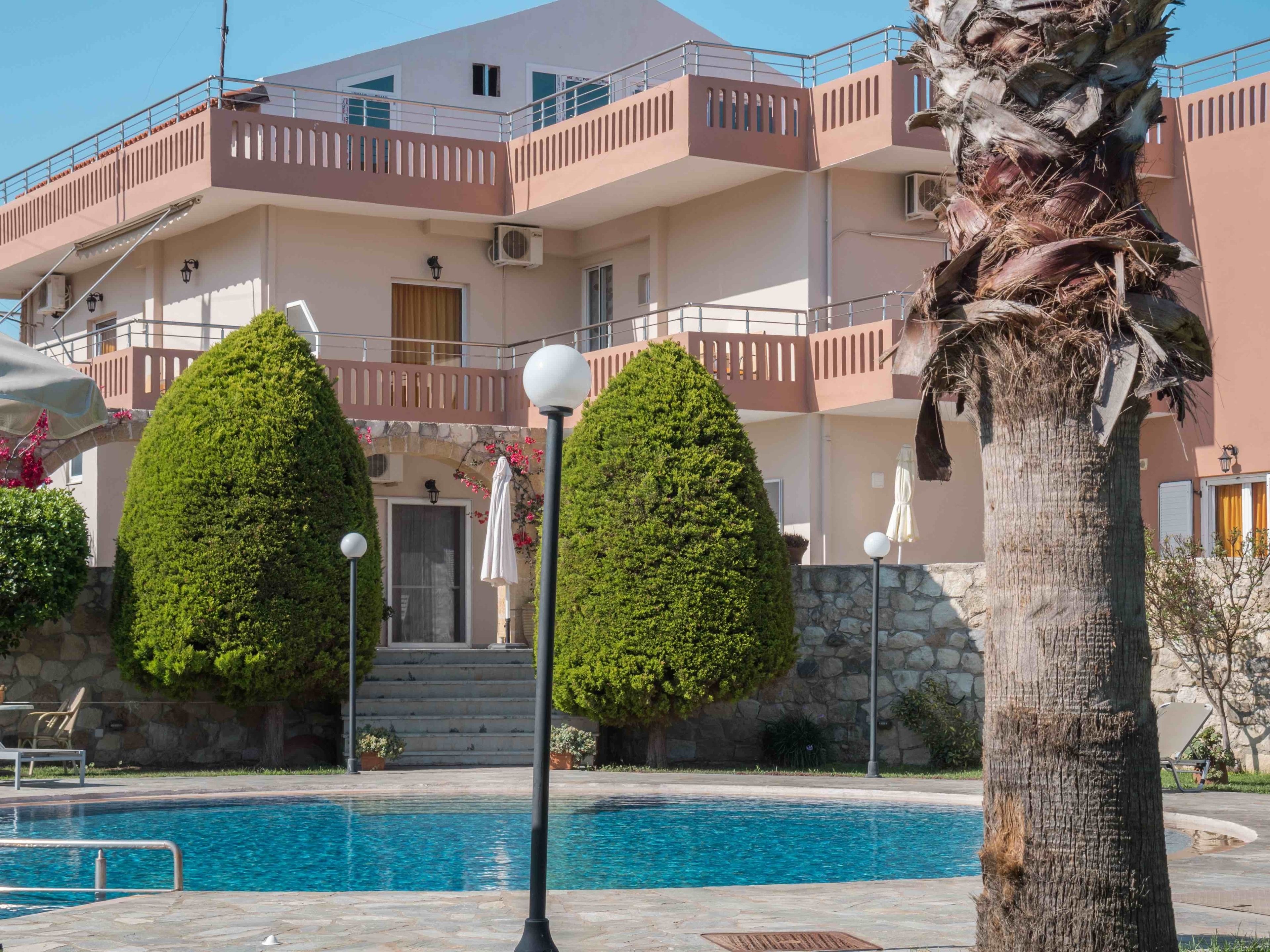 seasonal outdoor pool, pool umbrellas, pool loungers