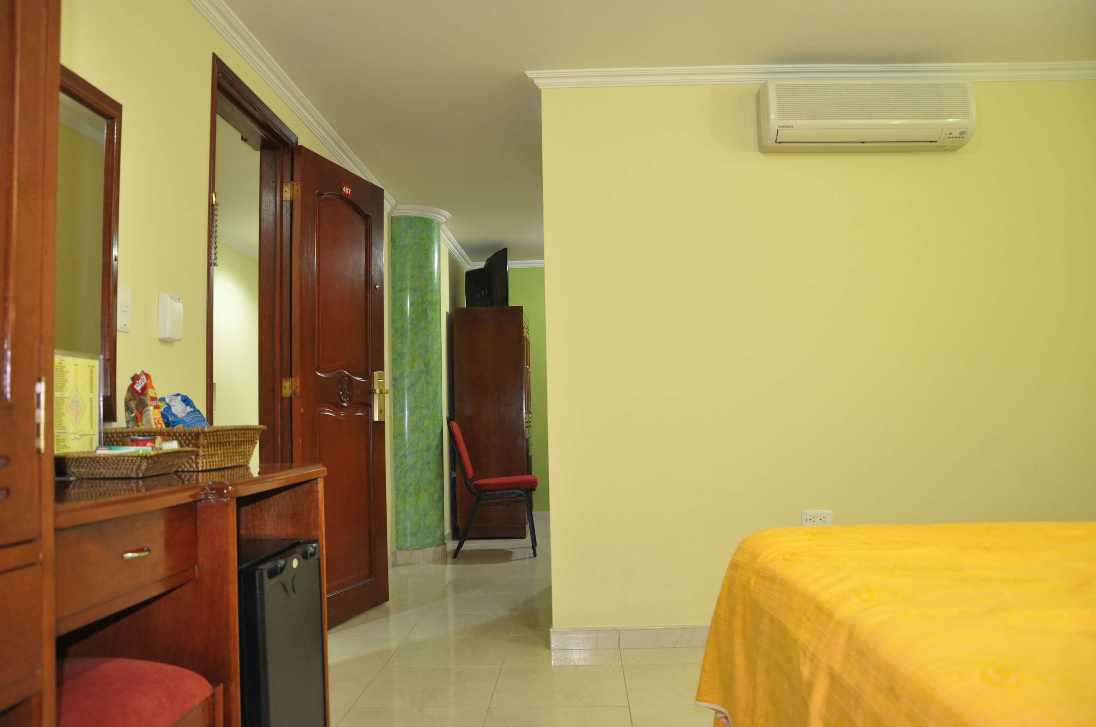 superior twin room | minibar, in-room safe, desk, iron/ironing board