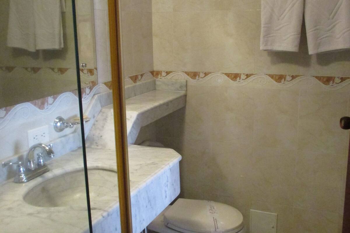 triple room, multiple beds | bathroom | shower, towels