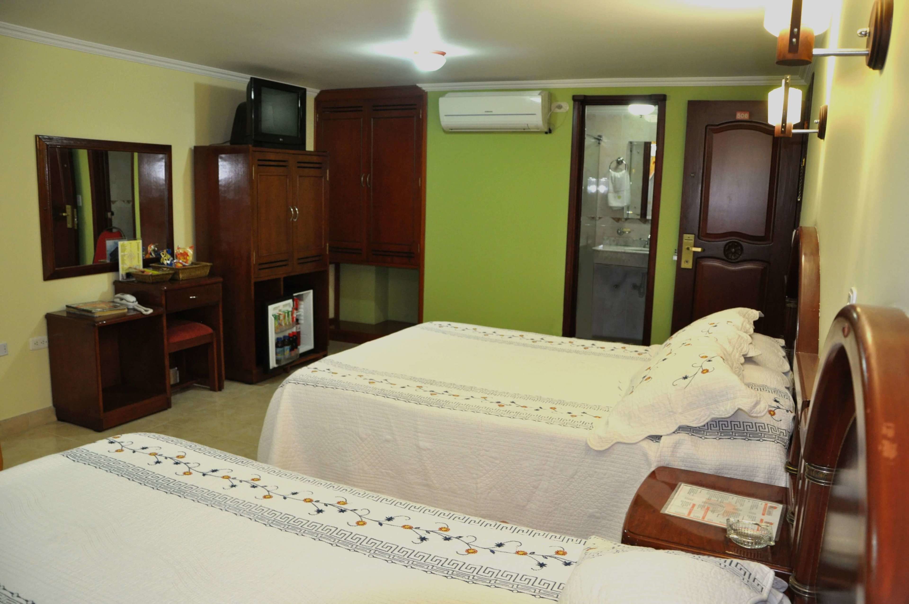 twin room | minibar, in-room safe, desk, iron/ironing board