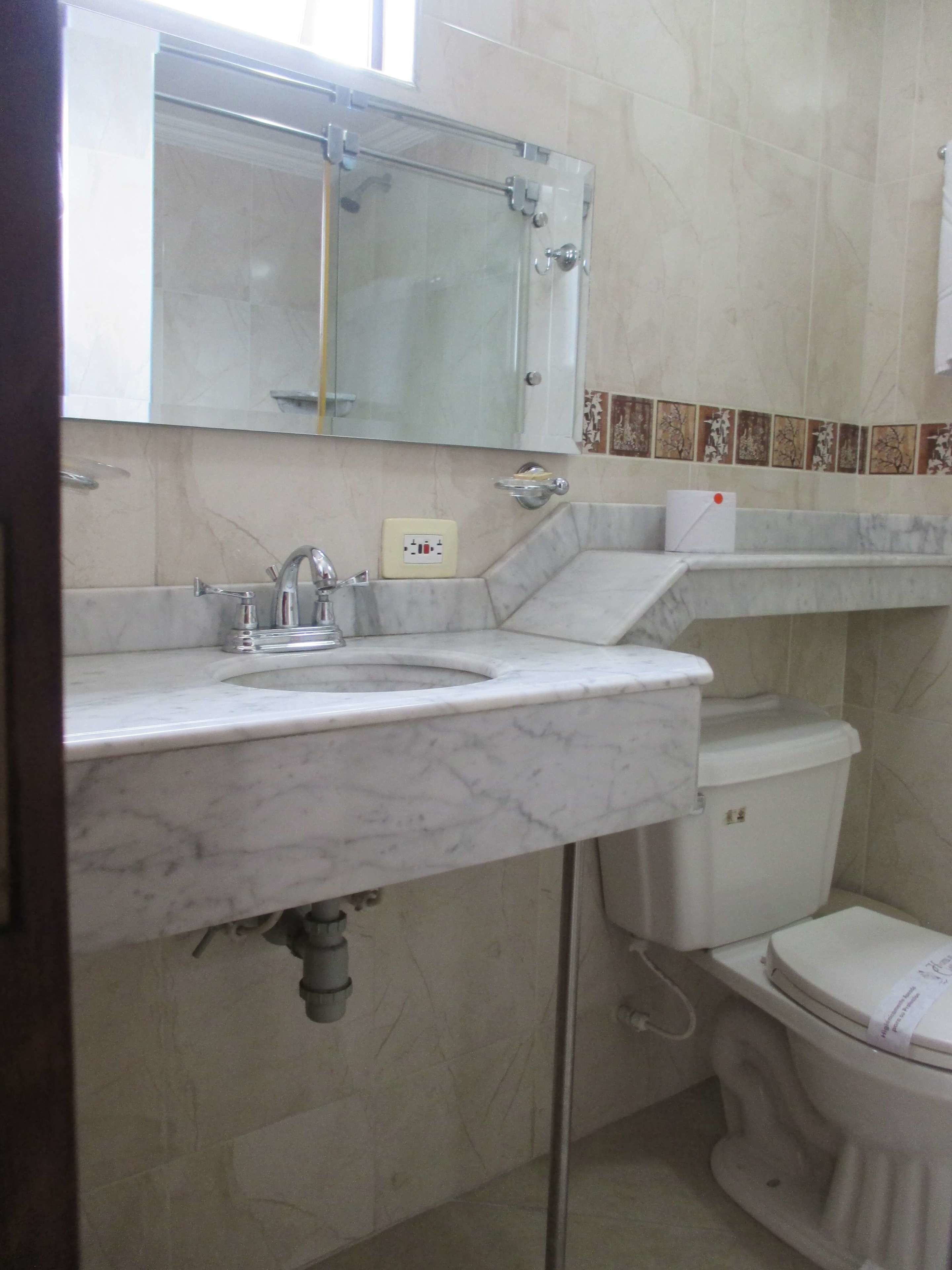 superior triple room | bathroom | shower, towels