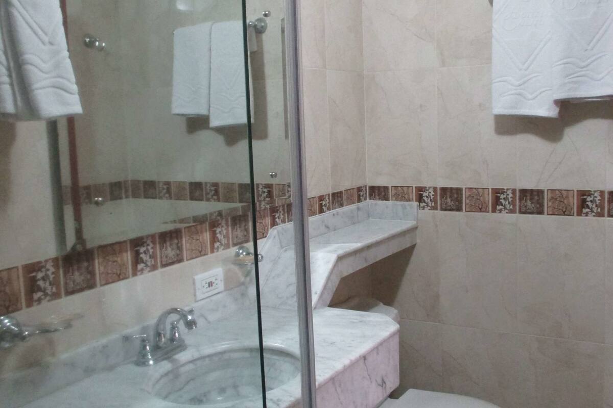 twin room | bathroom | shower, towels