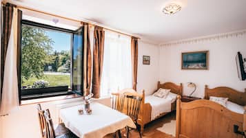 Family Quadruple Room, 2 Bedrooms | Minibar, blackout drapes, free WiFi, bed sheets
