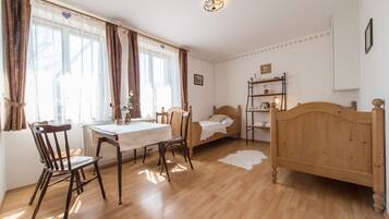 Family Quadruple Room, 2 Bedrooms | Minibar, blackout drapes, free WiFi, bed sheets