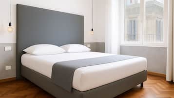 Chambre Deluxe Double ou avec lits jumeaux | Coffres-forts dans les chambres, bureau, Wi-Fi gratuit, draps fournis