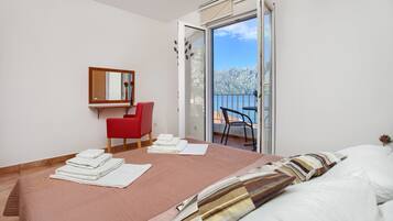 Apartment, 1 Bedroom, Sea View | Desk, iron/ironing board, free WiFi, bed sheets