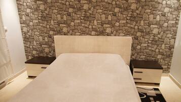 Apartemen Basic | 1 kamar tidur, tirai kedap cahaya, dan setrika/meja setrika