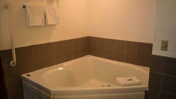 Standard Suite, 1 King Bed | Bathroom | Shower, towels