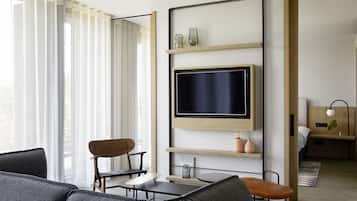 Suite, 1 King Bed, Ensuite | Living room | Flat-screen TV