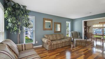 Executive Villa, 4 Bedrooms | Living area | 55-inch flat-screen TV with cable channels, TV, fireplace