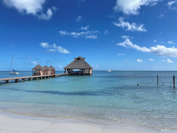 Private beach, white sand, sun-loungers, beach umbrellas